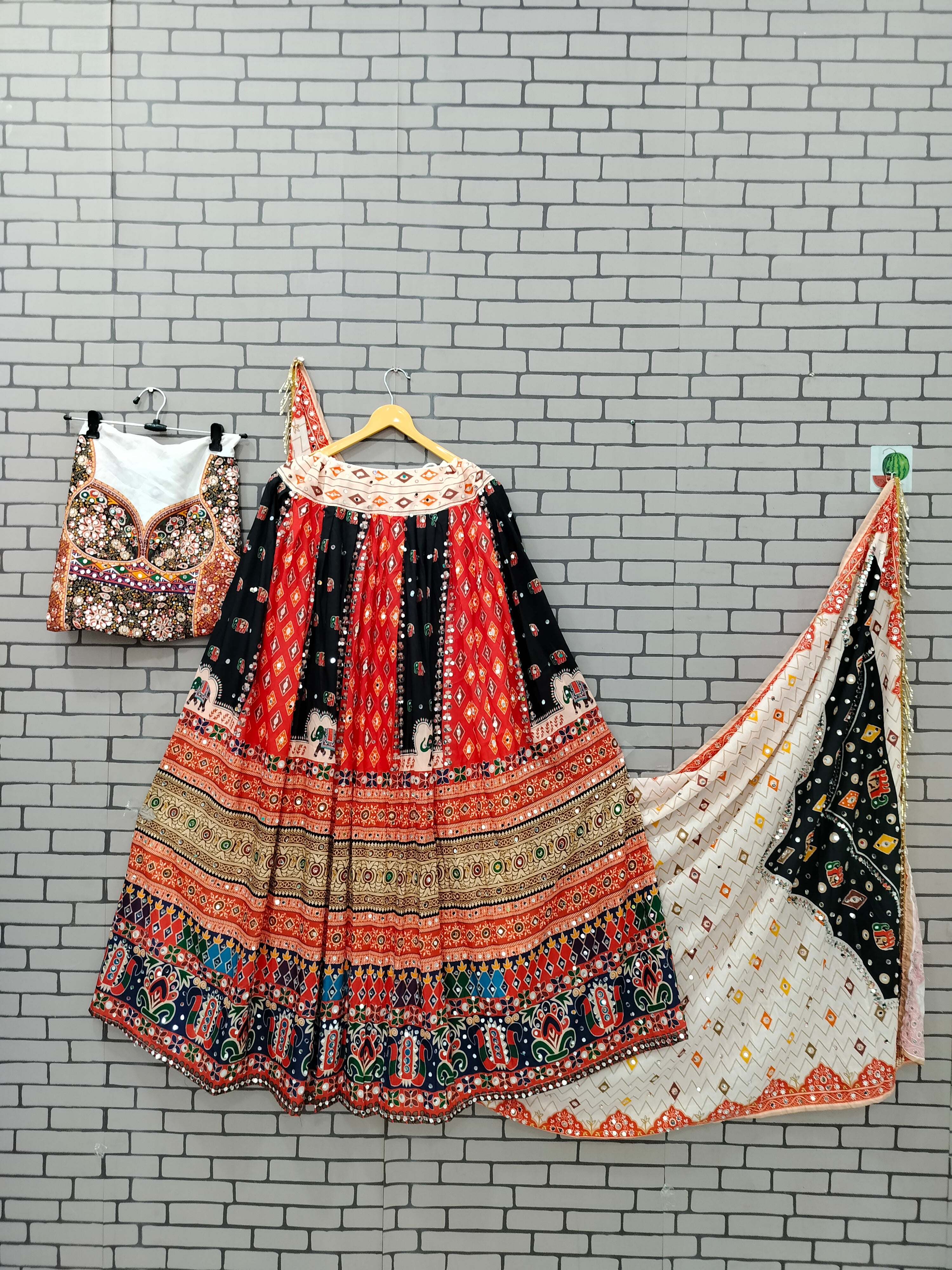 Traditional Kinjal Dave Special Print And MIrror Work Muslin Lehenga Choli