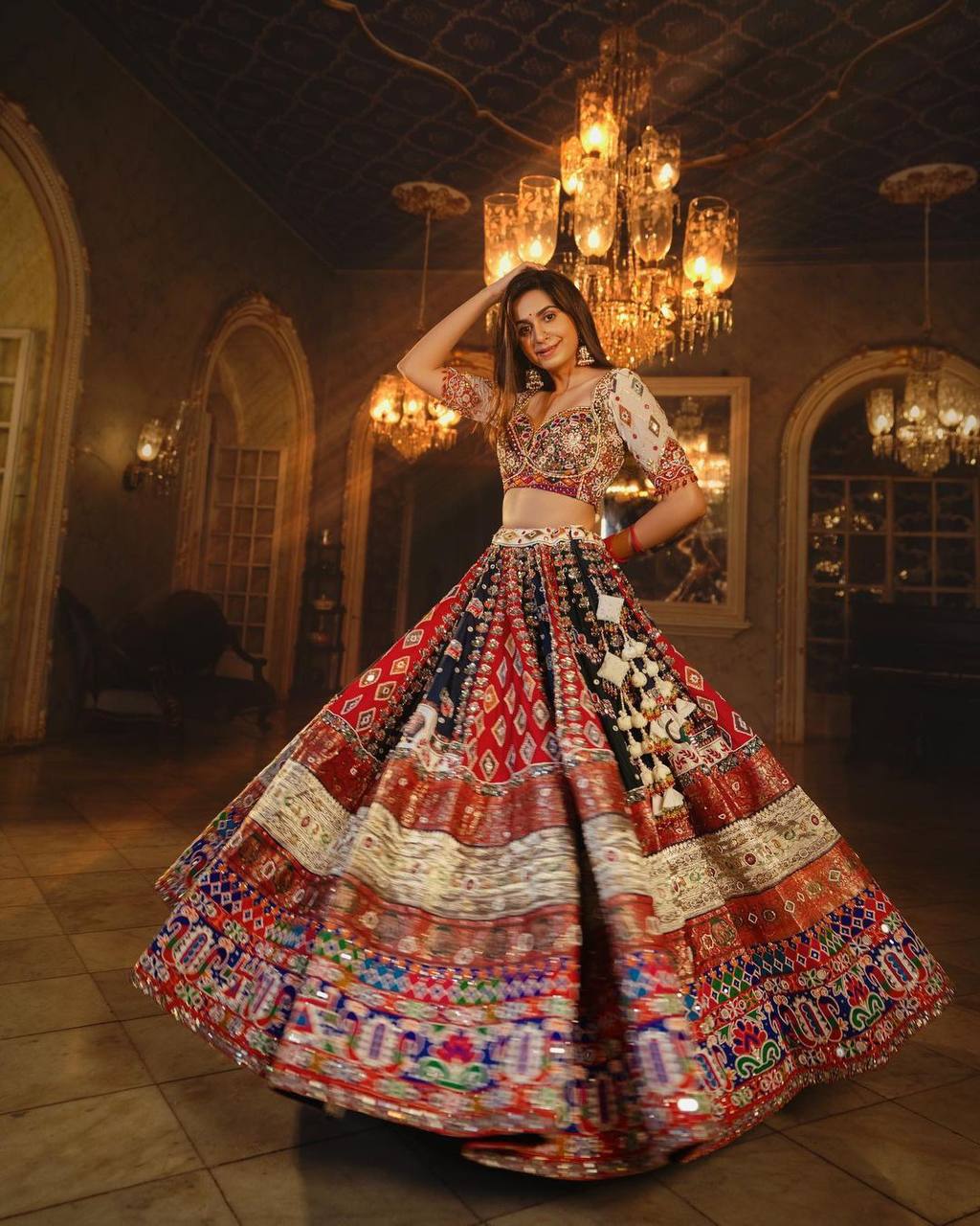 Traditional Kinjal Dave Special Print And MIrror Work Muslin Lehenga Choli